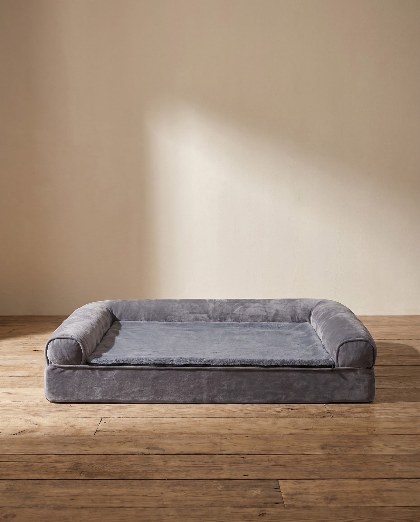 Sofa-Style Bolster Dog Bed, Waterproof, styled in a home setting