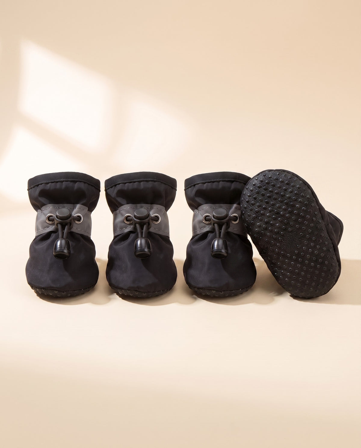 Waterproof Anti-Slip Dog Boots, Set of 4, styled in a home setting