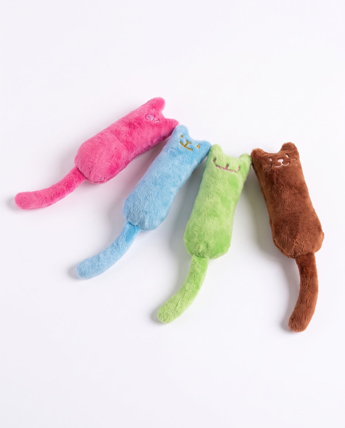 Plush Catnip Kicker Cat Toys, styled in a home setting