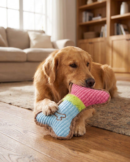 Squeaky Plush Bone Toy for Dogs, in use at home