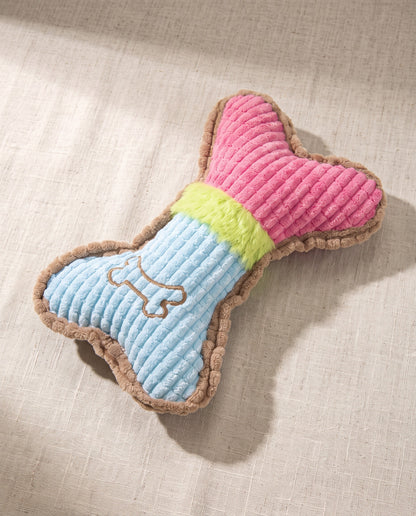 Squeaky Plush Bone Toy for Dogs, styled in a home setting