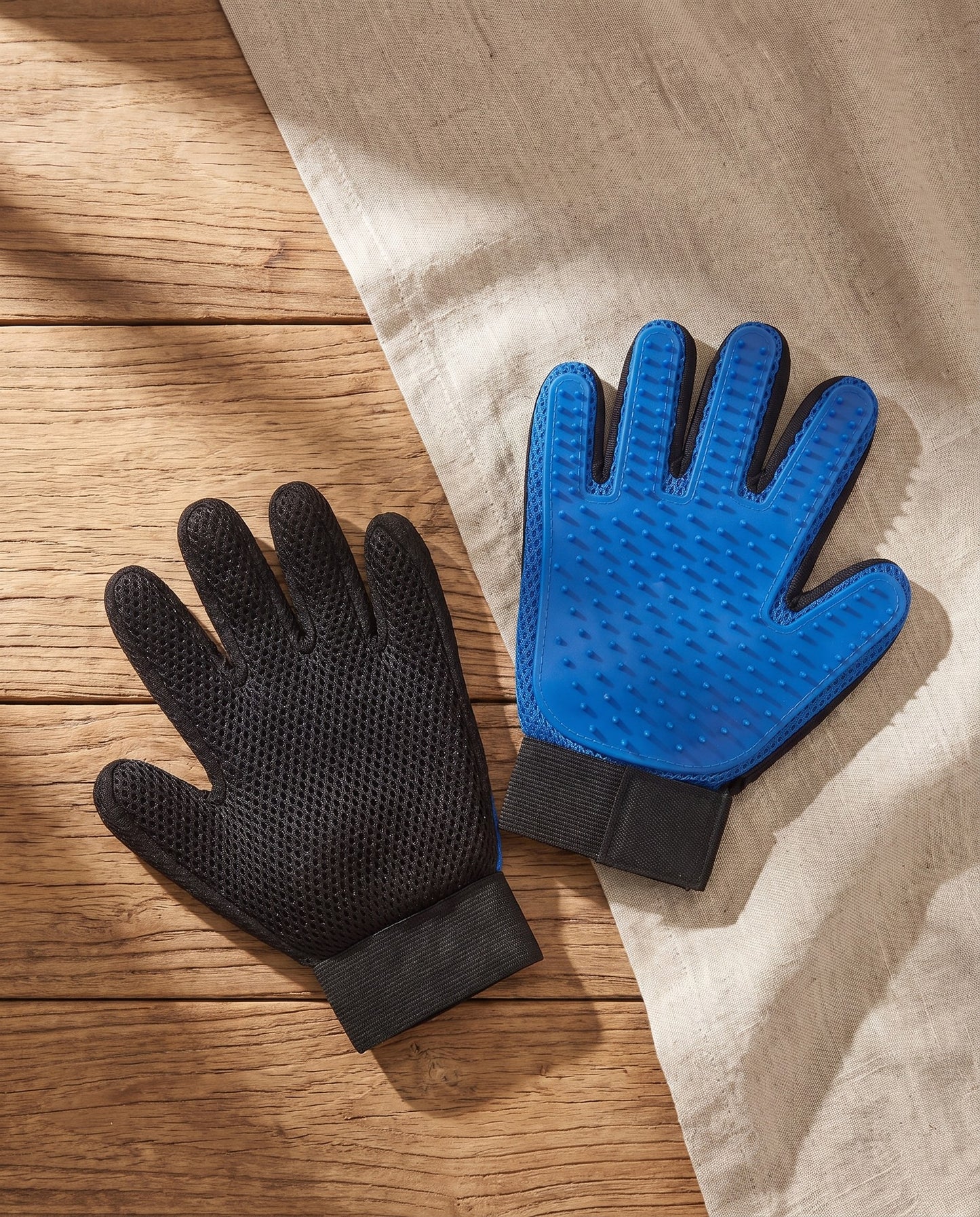 Deshedding Grooming Glove for Dogs and Cats, styled in a home setting