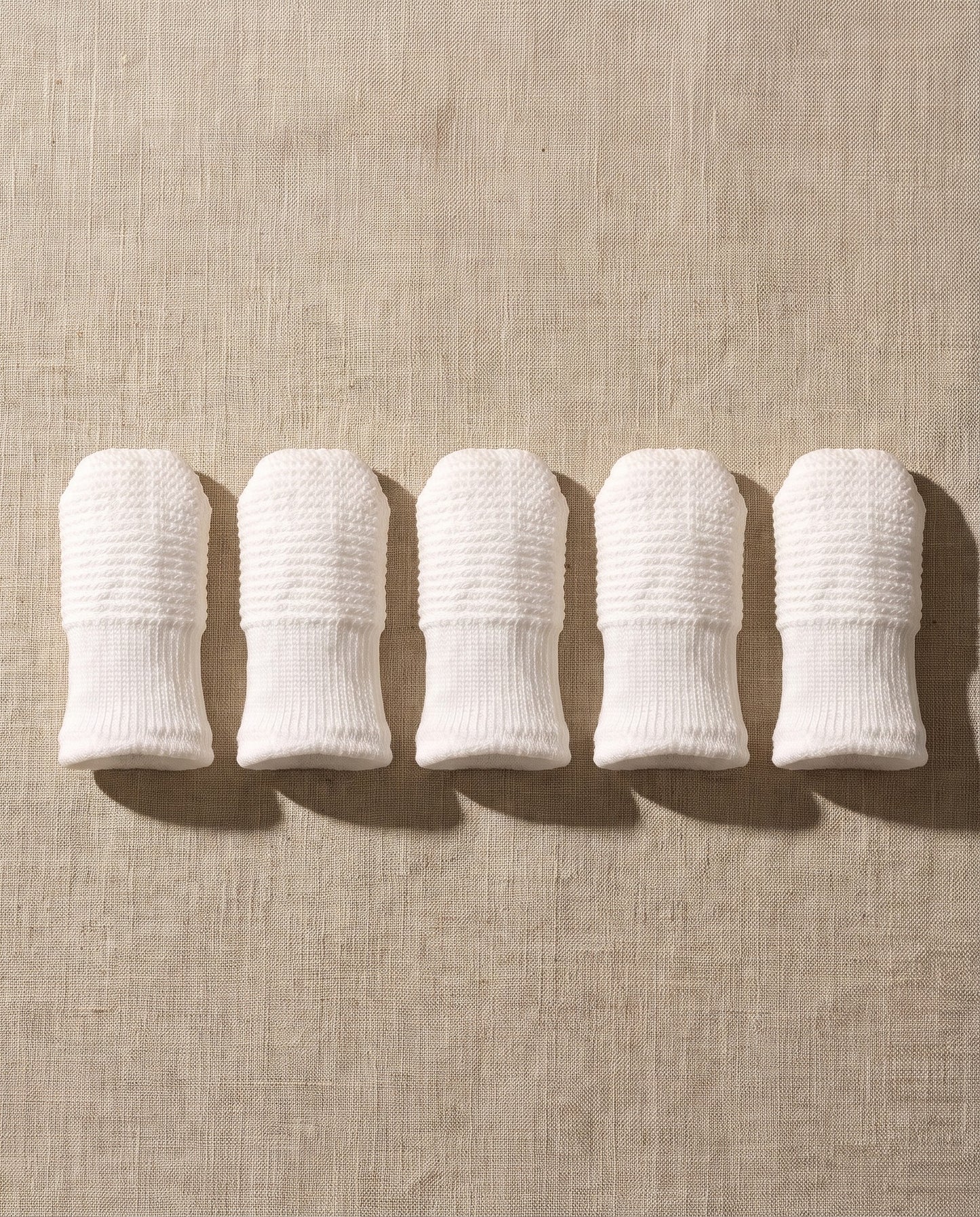 Finger Toothbrush Cots for Dogs and Cats, styled in a home setting