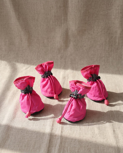 Waterproof Dog Rain Boots, Set of 4, styled in a home setting