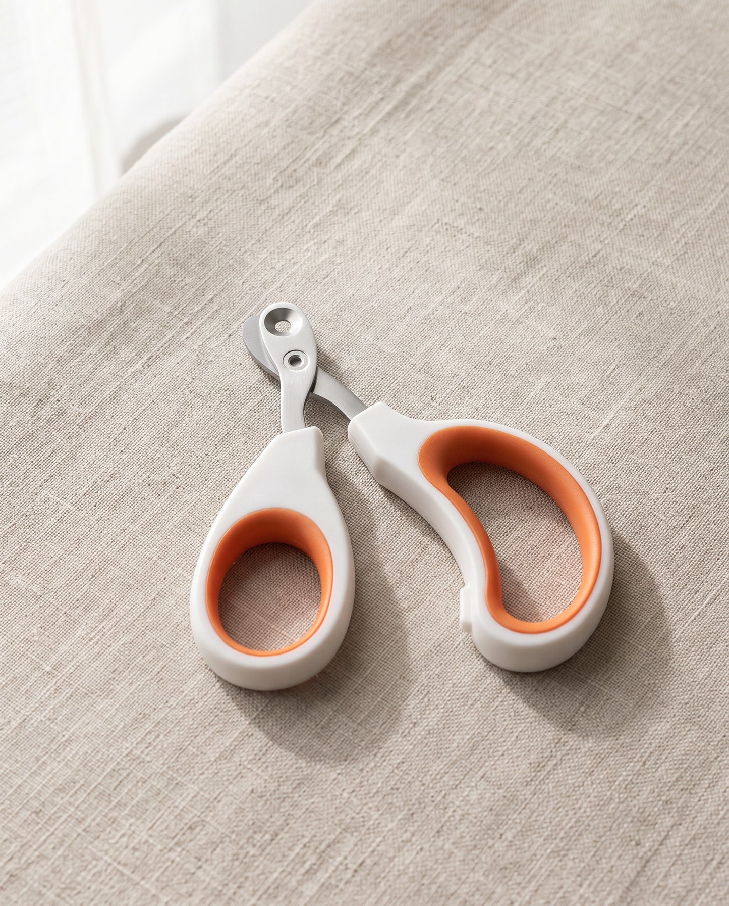 Circular-Hole Claw Scissors for Cats and Small Dogs, styled in a home setting