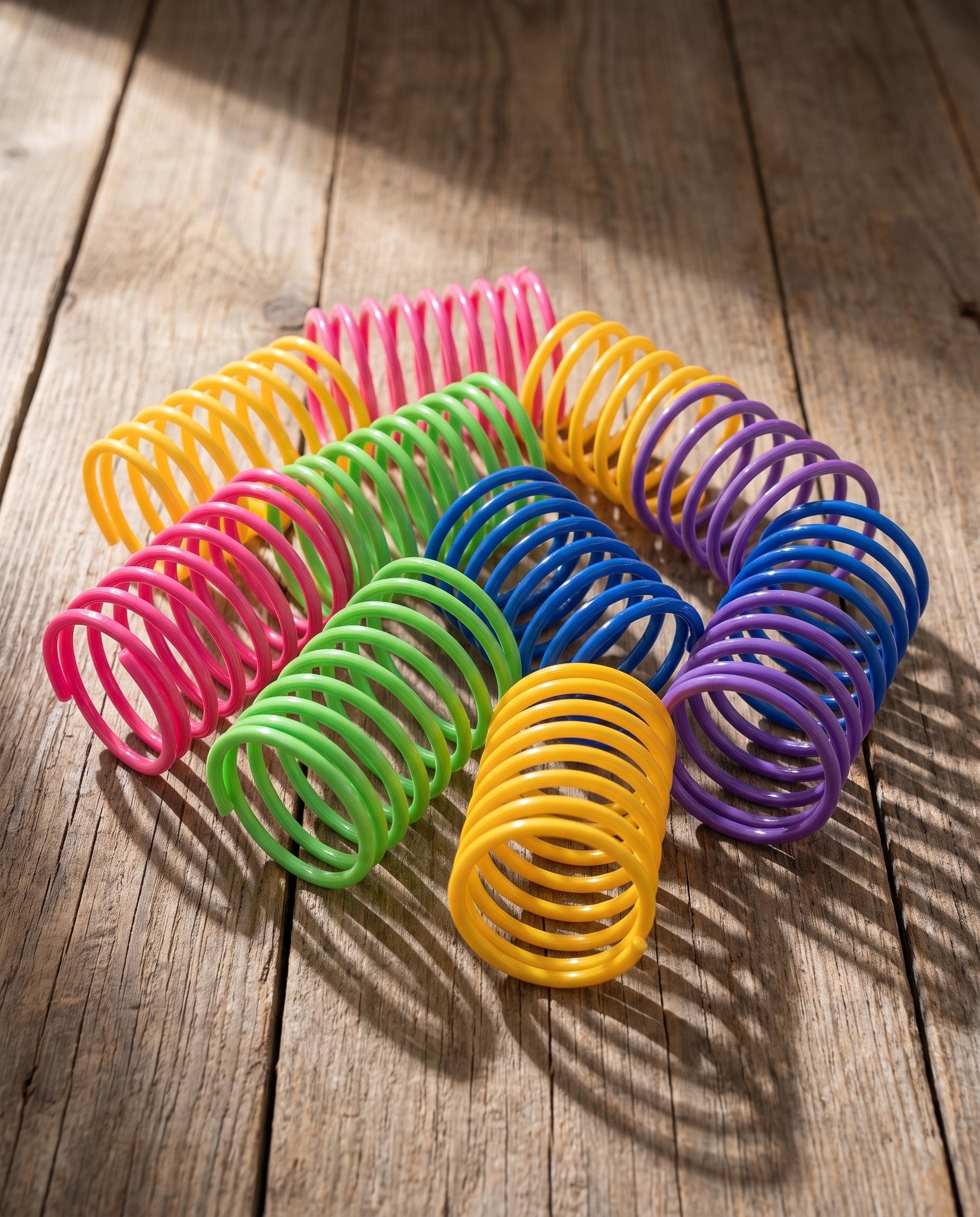 Spiral Spring Cat Toys, Multi Pack, styled in a home setting