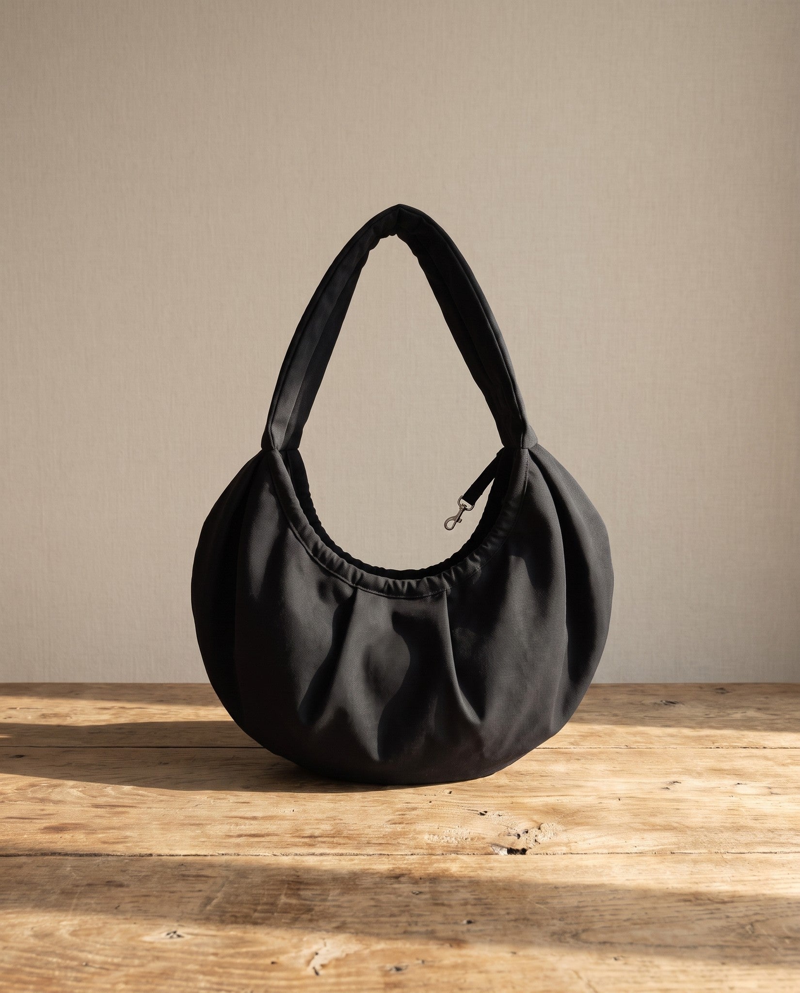 Crossbody Sling Carrier for Small Pets, styled in a home setting