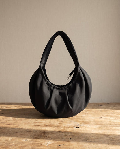 Crossbody Sling Carrier for Small Pets, styled in a home setting