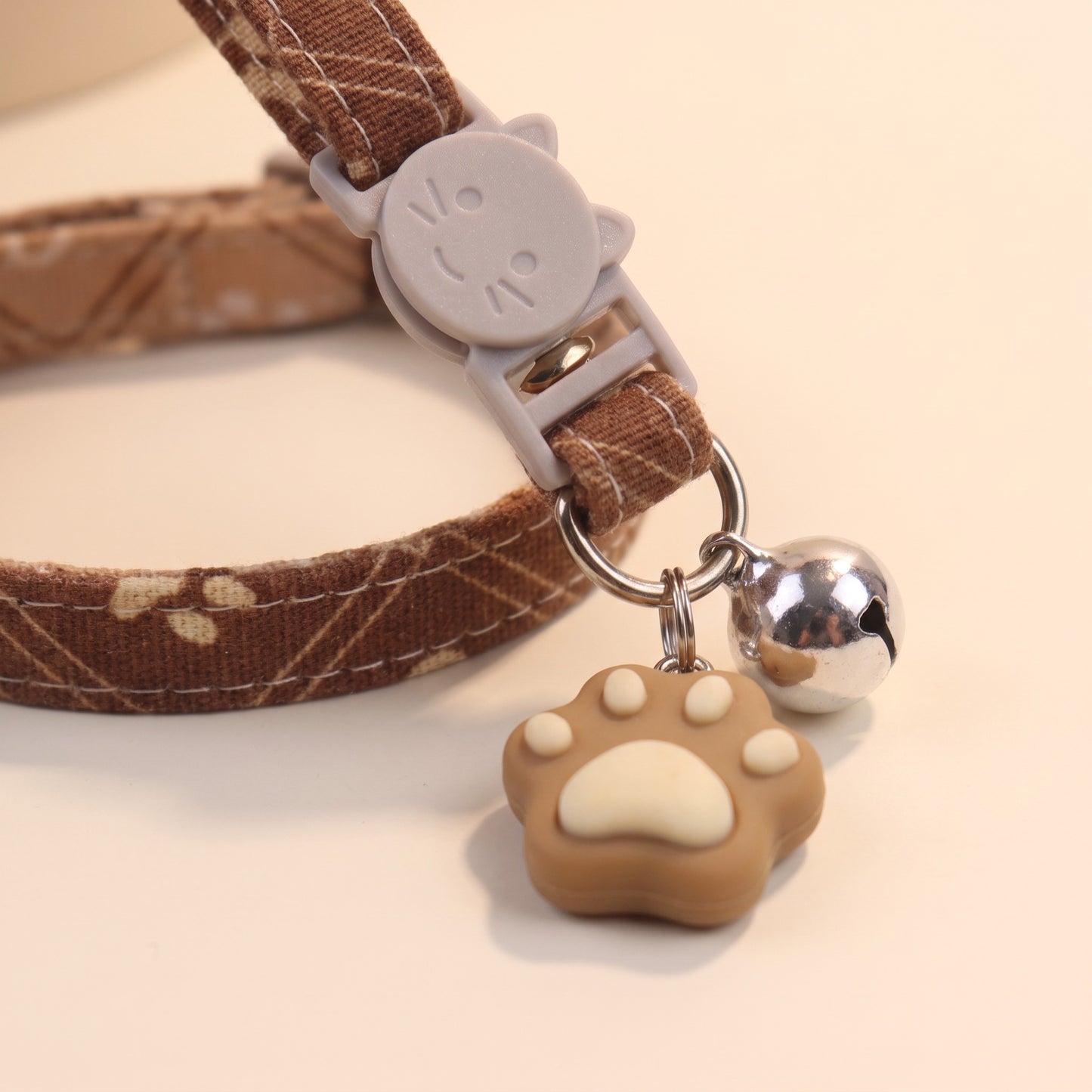 Breakaway Cat Collar with Paw Charm, close-up detail