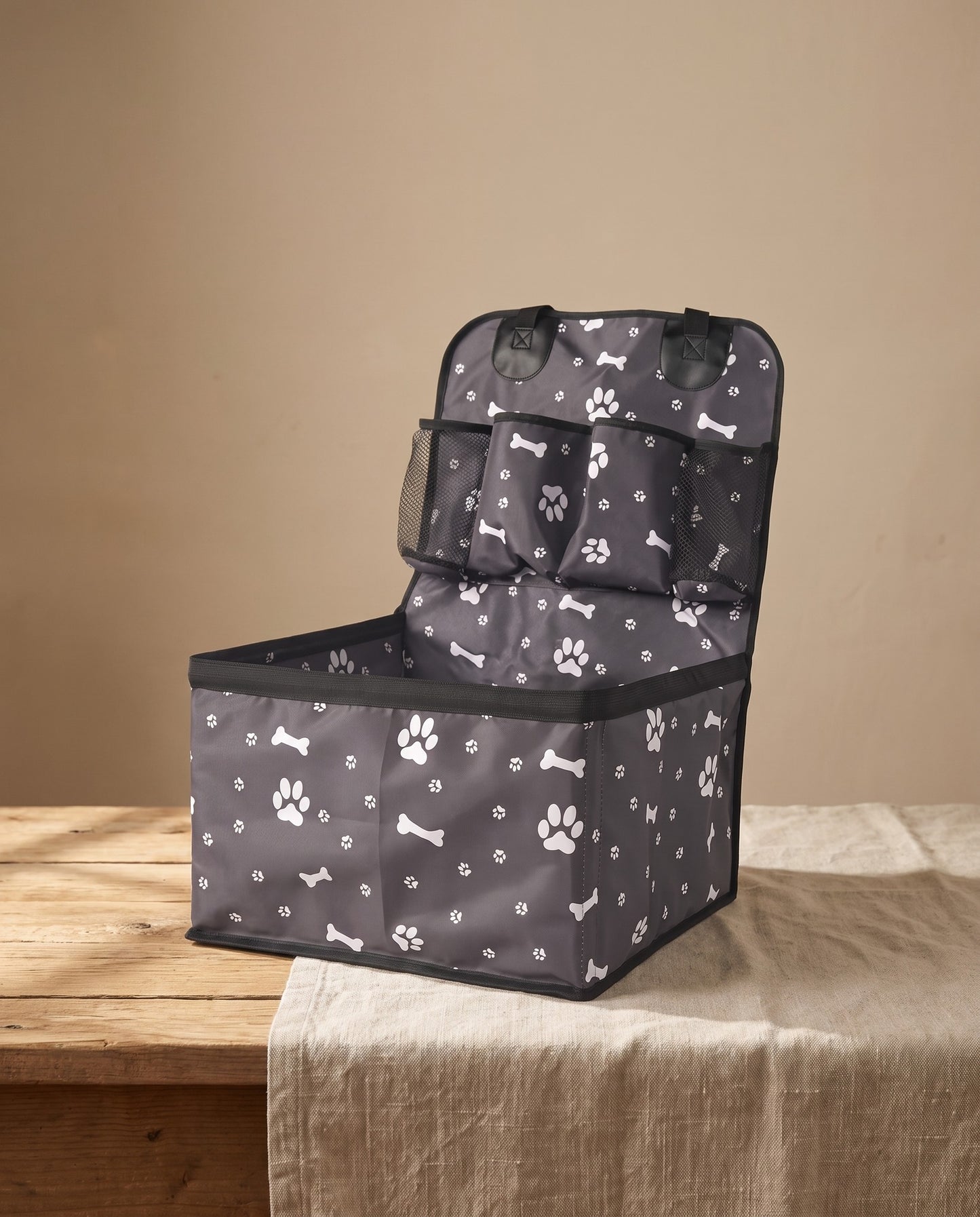 Dog Car Booster Seat with Storage Pockets, styled in a home setting