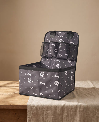 Dog Car Booster Seat with Storage Pockets, styled in a home setting