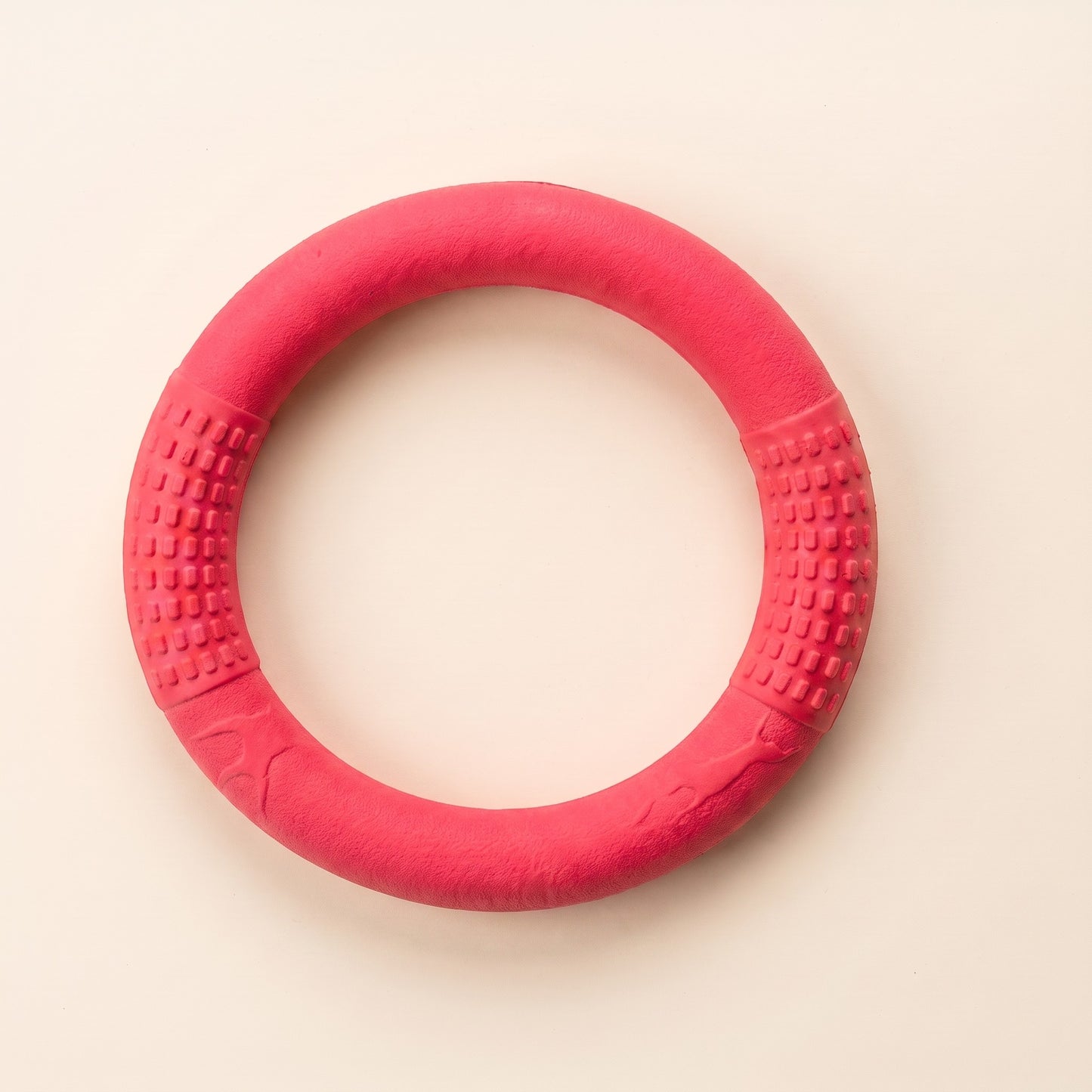 Rubber Ring Tug and Fetch Toy in rose red, a vivid pink-red