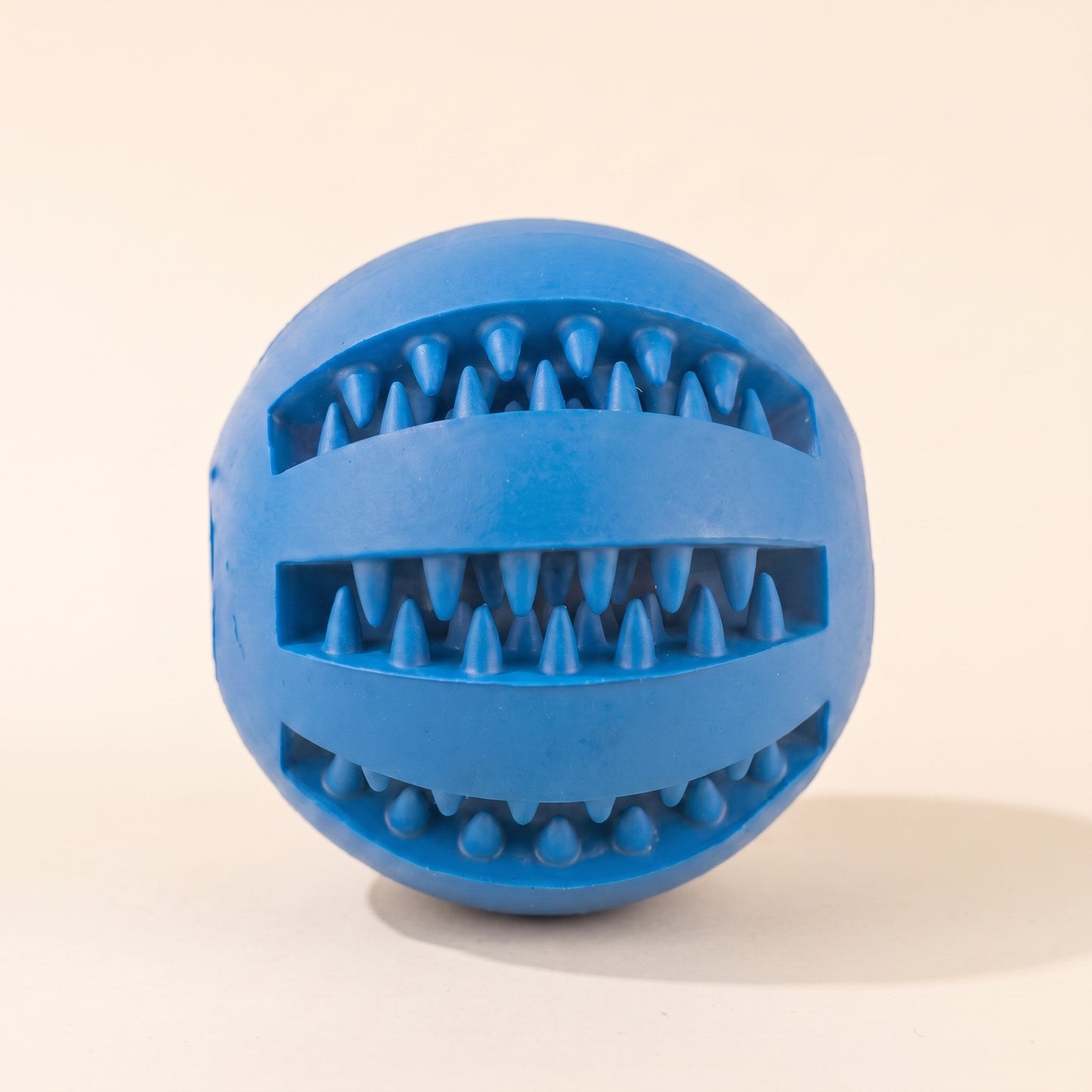Rubber Treat Ball with Teeth-Cleaning Grooves in blue
