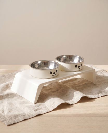 Low Elevated Double Bowl Feeder, styled in a home setting