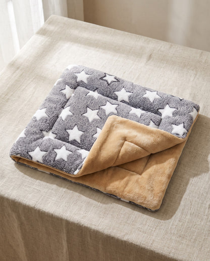 Reversible Flannel Pet Mat and Blanket, styled in a home setting