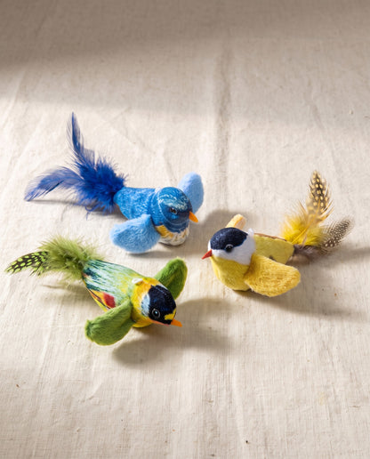 Chirping Feather Bird Cat Toys, styled in a home setting