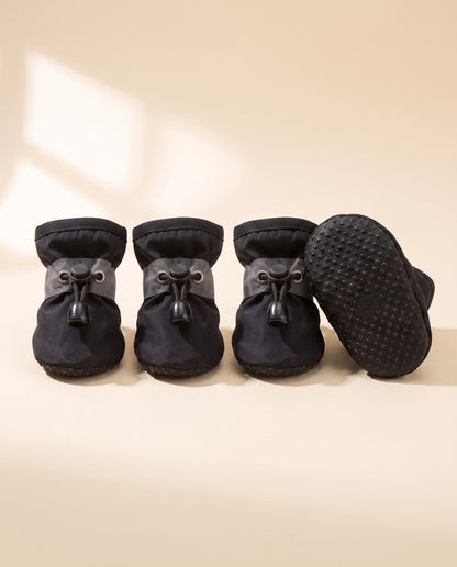 Waterproof Anti-Slip Dog Boots, Set of 4, styled in a home setting