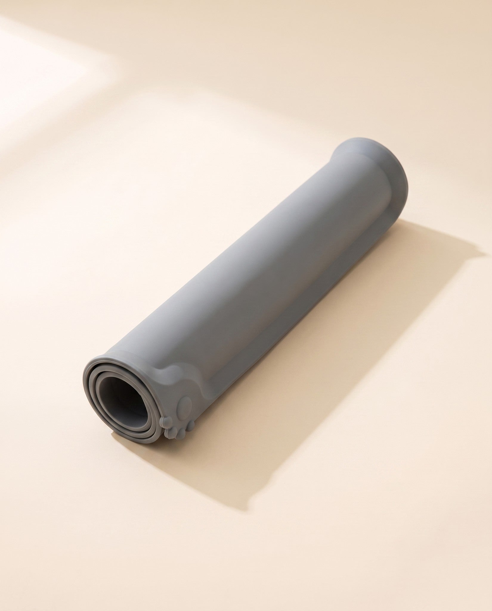 Silicone Feeding Mat with Raised Edge, styled in a home setting
