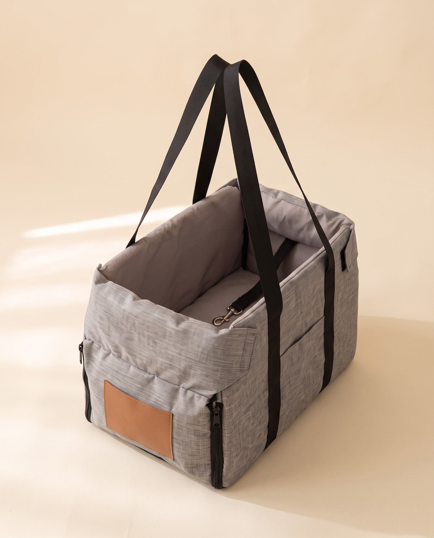 Console Booster Car Seat and Carrier, styled in a home setting