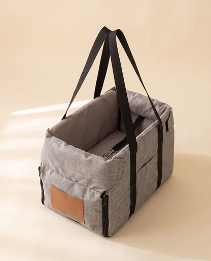 Console Booster Car Seat and Carrier, styled in a home setting