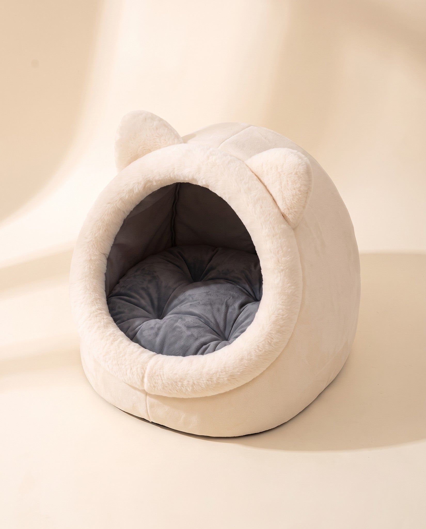Cat-Face Tent Cave Bed, styled in a home setting