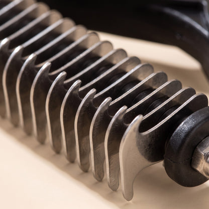 Two-Sided Dematting and Deshedding Rake, close-up detail