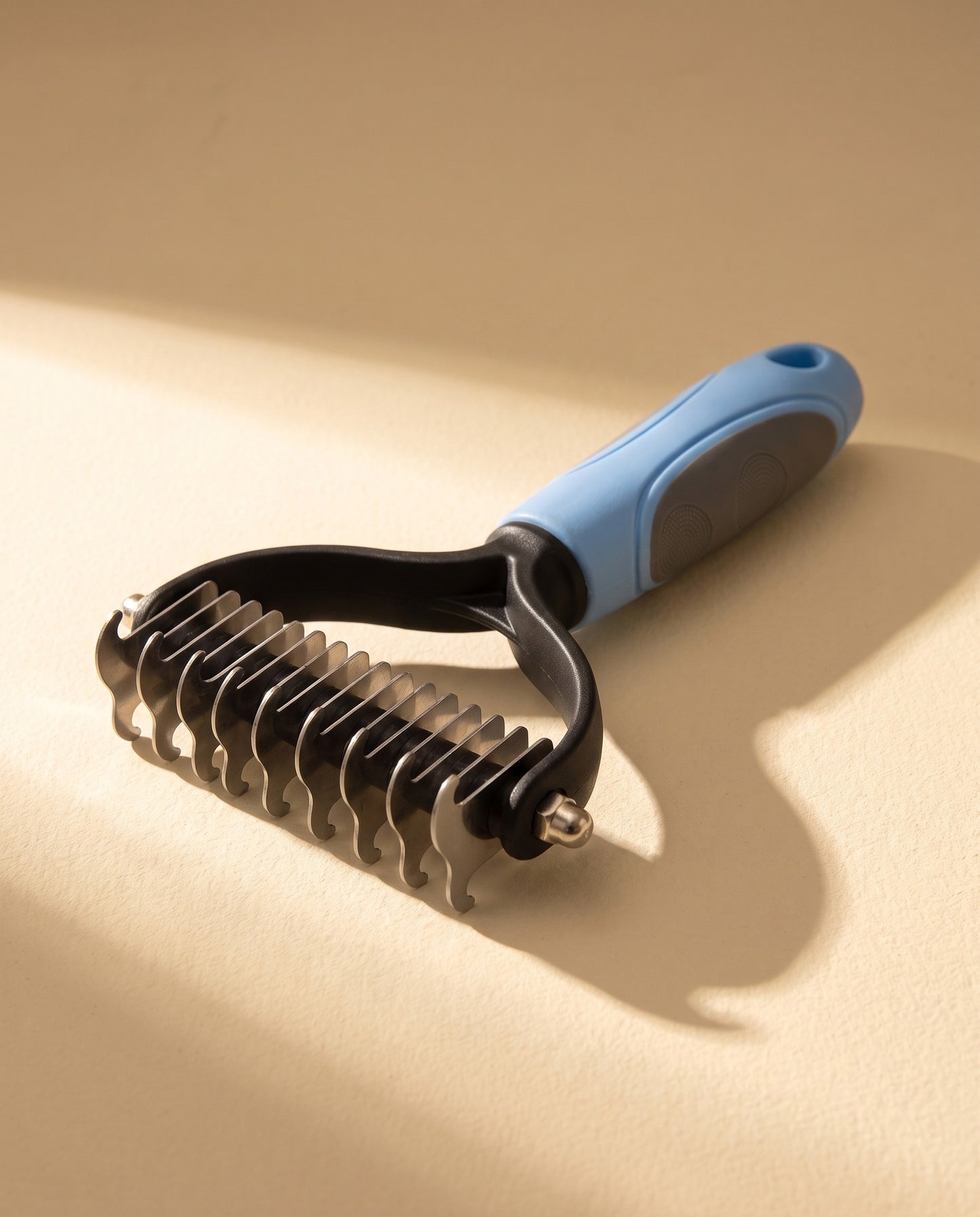 Extra-Wide Dual-Sided Dematting Brush, styled in a home setting