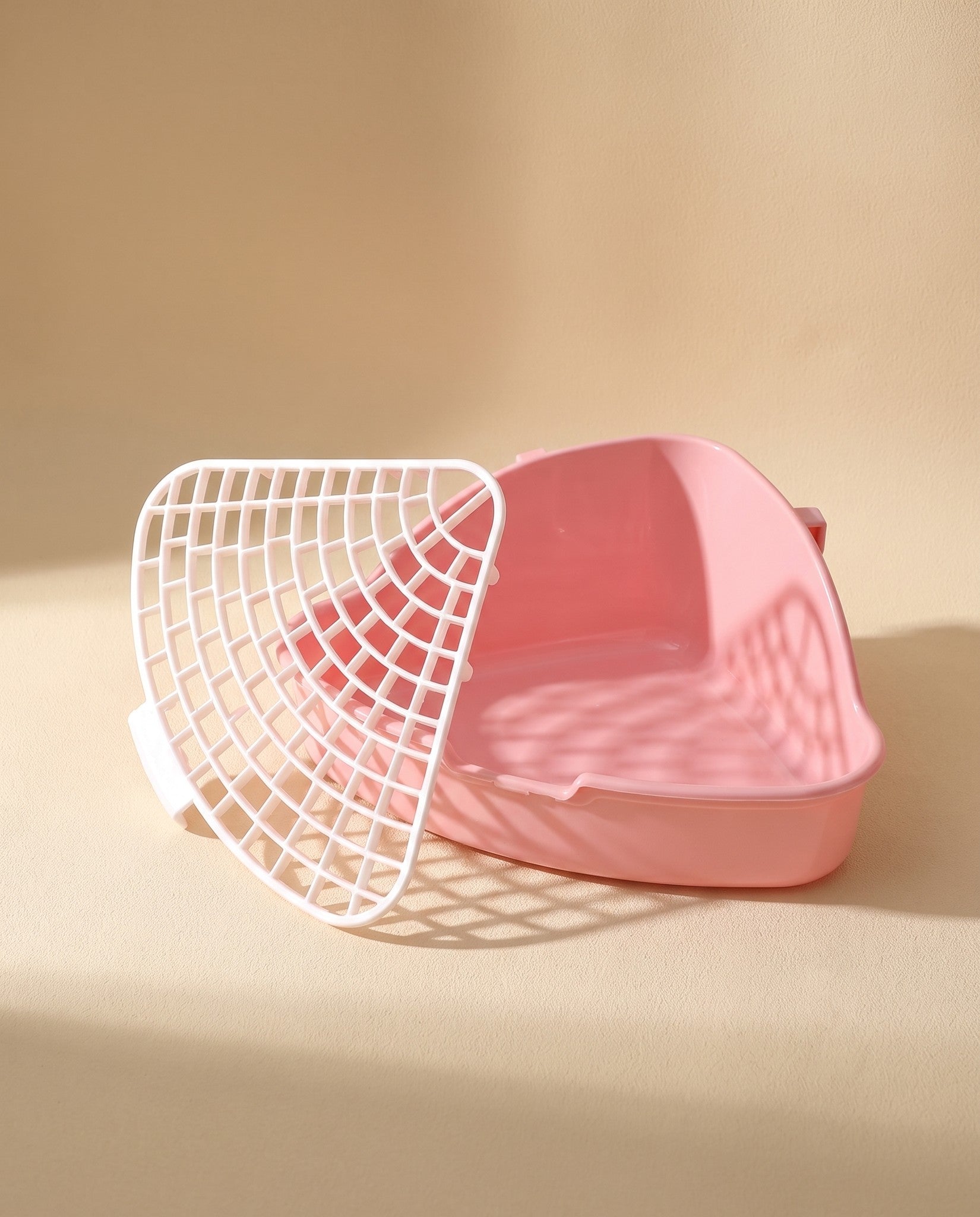 Corner Litter Tray for Rabbits and Small Pets, styled in a home setting