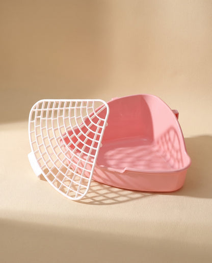 Corner Litter Tray for Rabbits and Small Pets, styled in a home setting