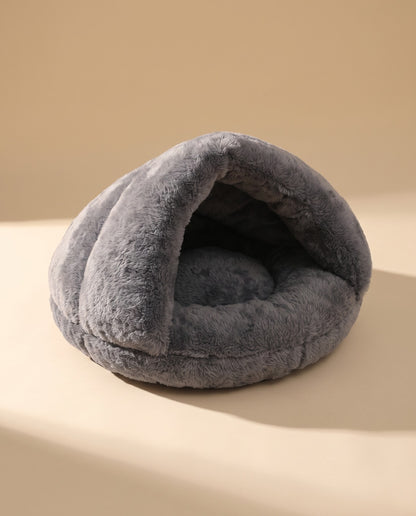 Plush Burrow Cave Bed for Cats, styled in a home setting