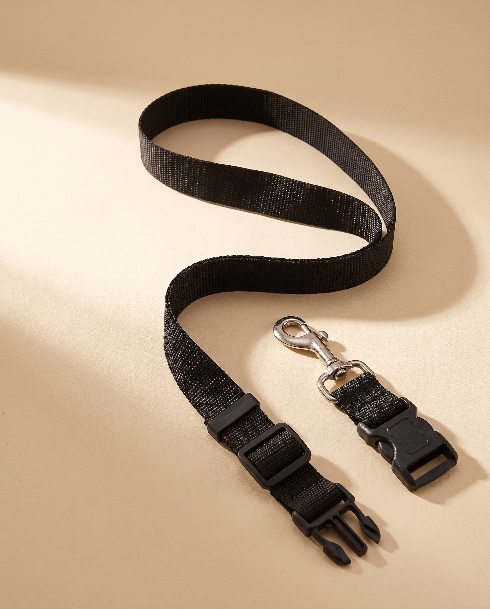 Adjustable Car Seat Belt Tether, styled in a home setting