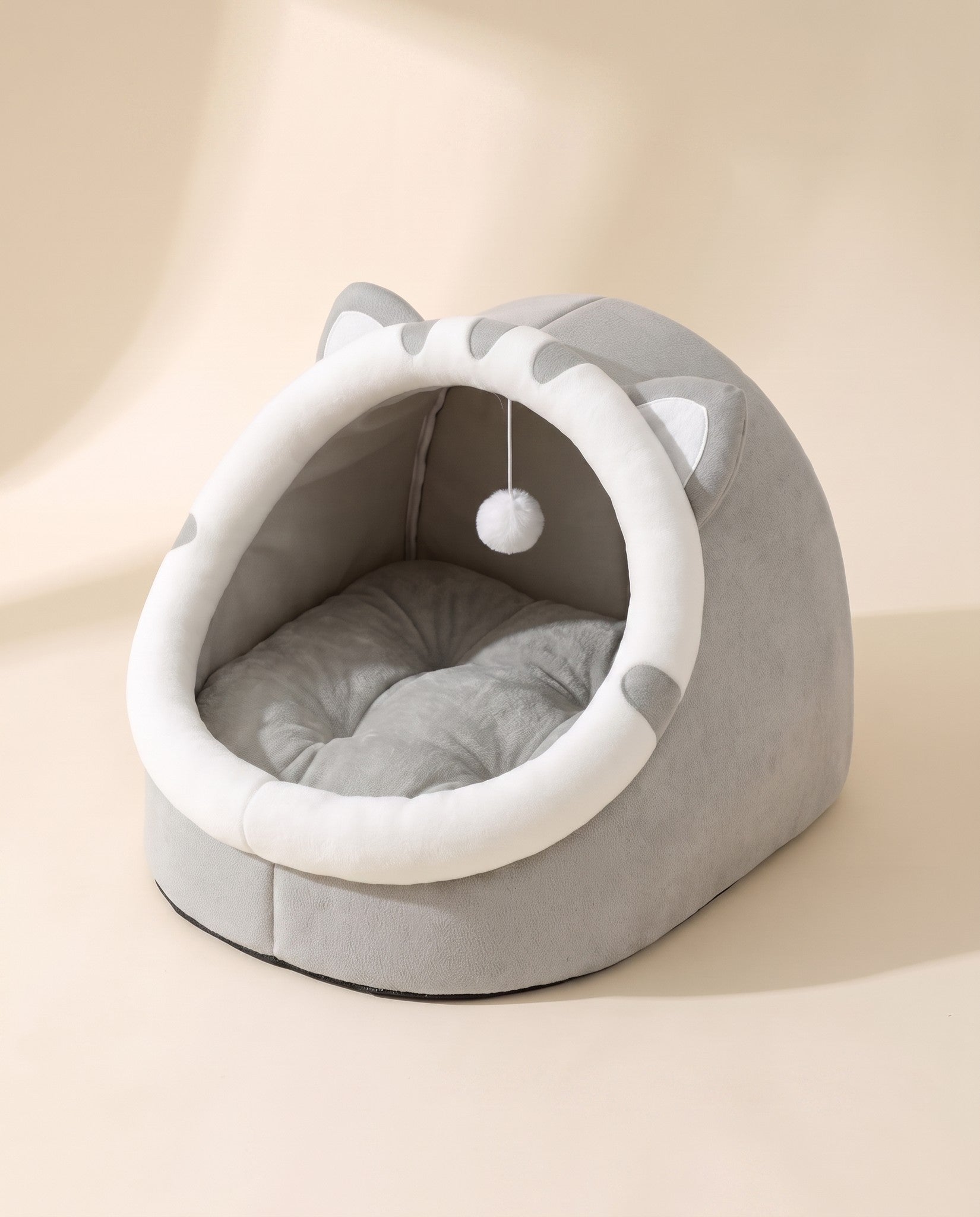 Cat-Face Hooded Cave Bed, styled in a home setting