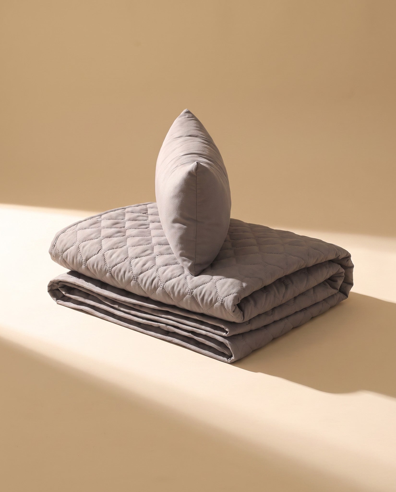 Waterproof Quilted Sofa and Car Pad, styled in a home setting