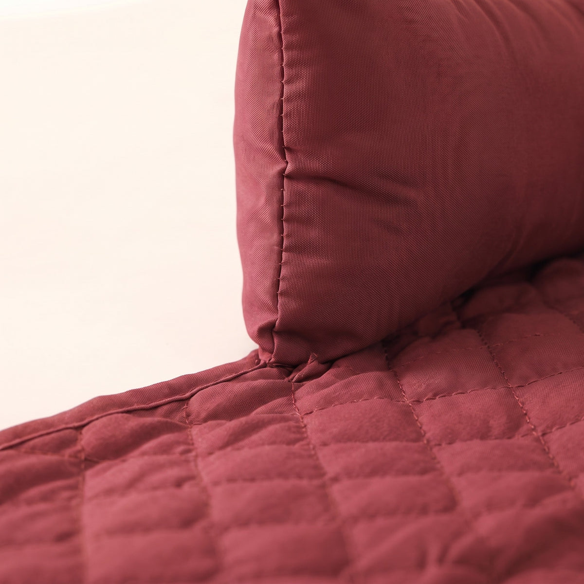 Quilted Sofa and Car Pad, Red, close-up detail