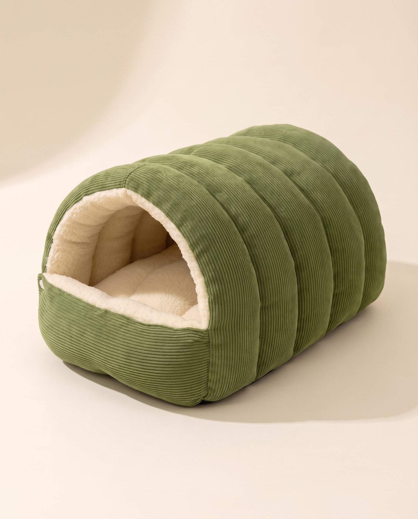 Corduroy Tunnel Cave Bed, styled in a home setting