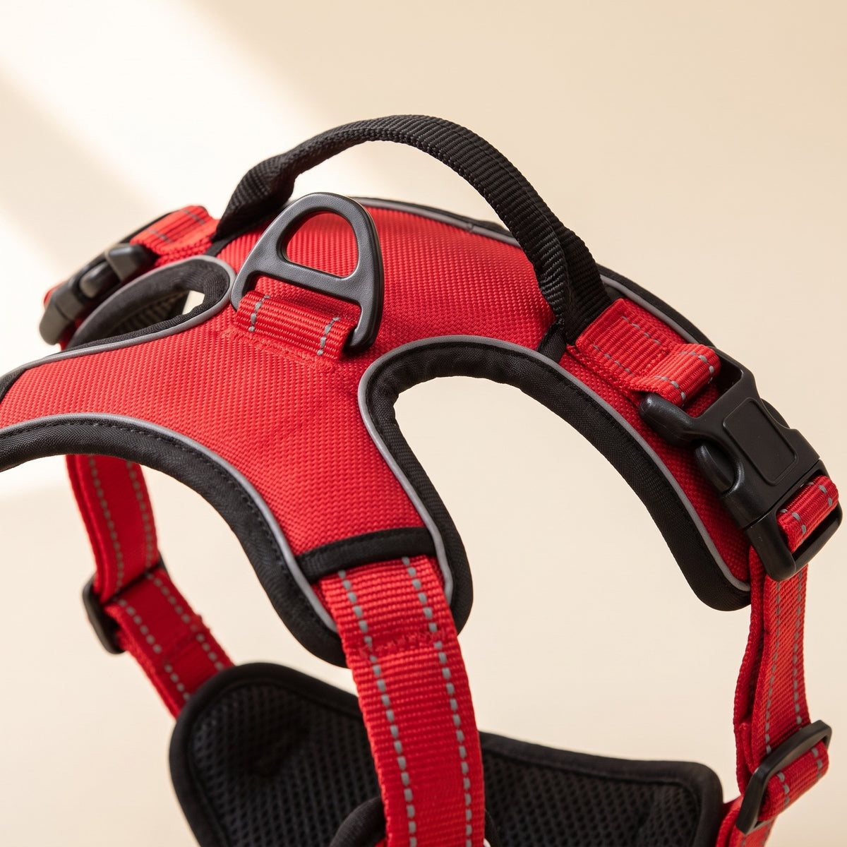 Reflective No-Pull Dog Harness, close-up of the chest plate, handle and reflective stitching