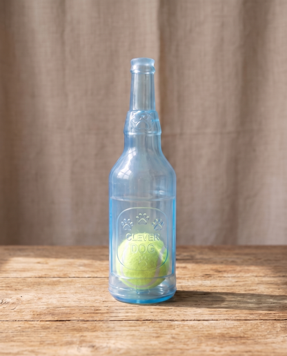 Beer Bottle Squeaky Toy with Tennis Ball, styled in a home setting