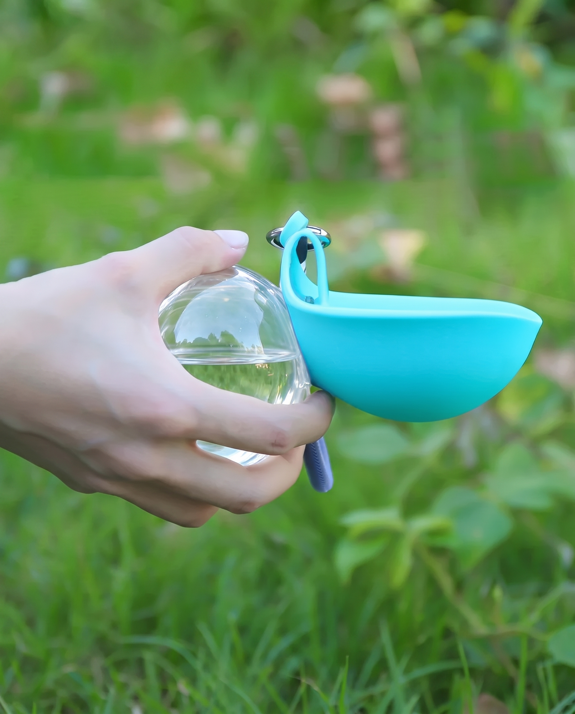 Portable Dog Water Bottle with Fold-Out Bowl, 285ml, in use on a walk