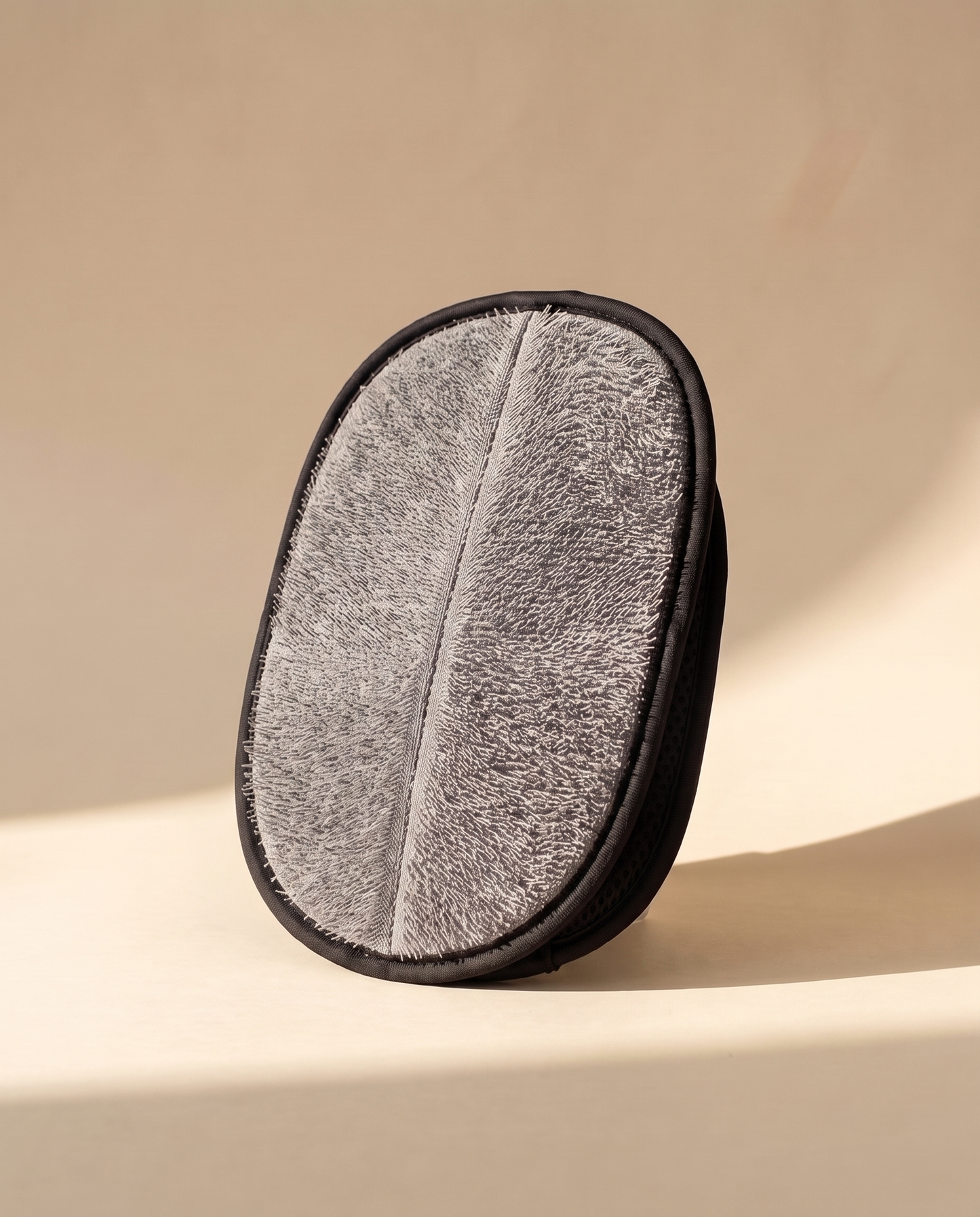 Reusable Pet Hair Removal Mitt, styled in a home setting