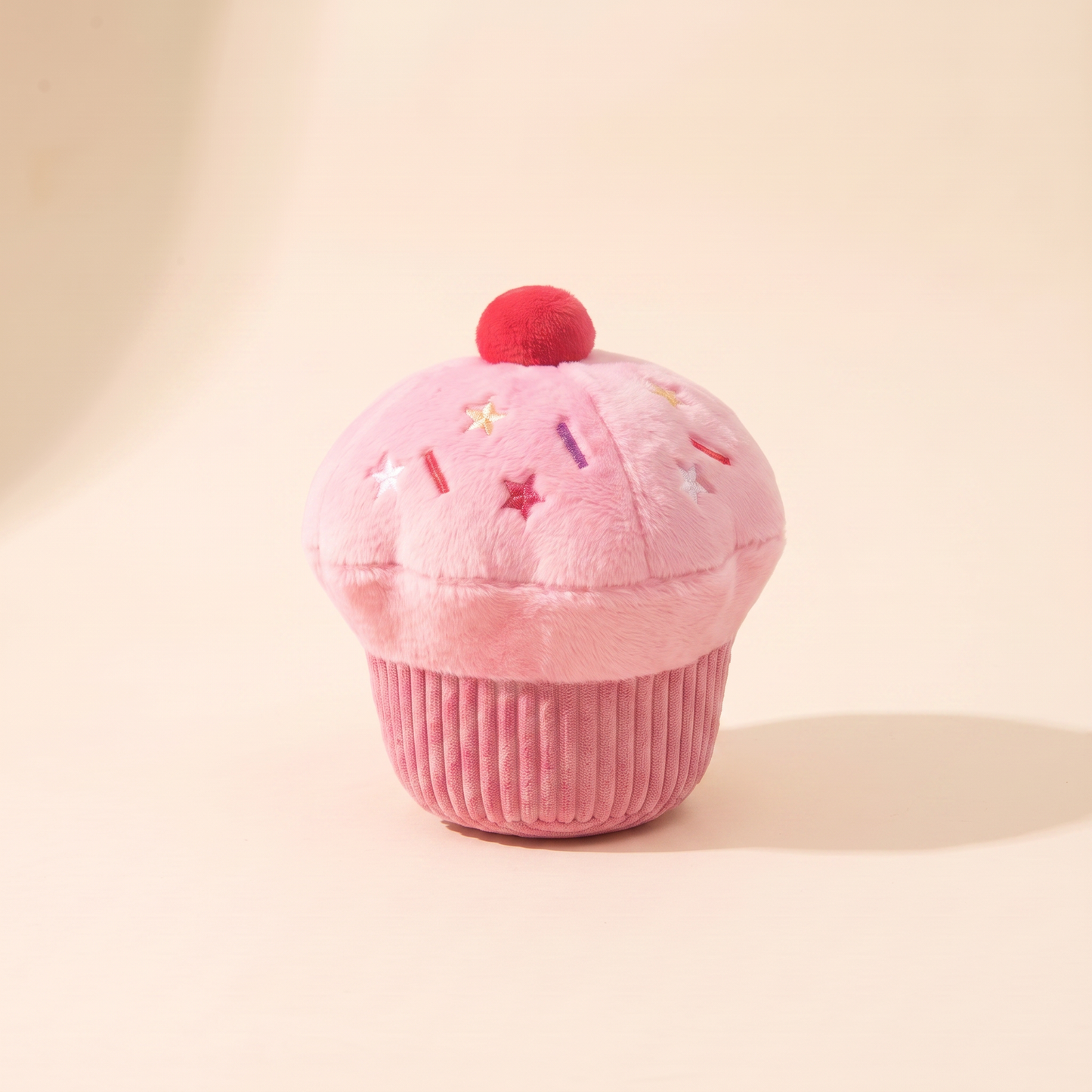 Squeaky Cupcake Plush Dog Toys in pink