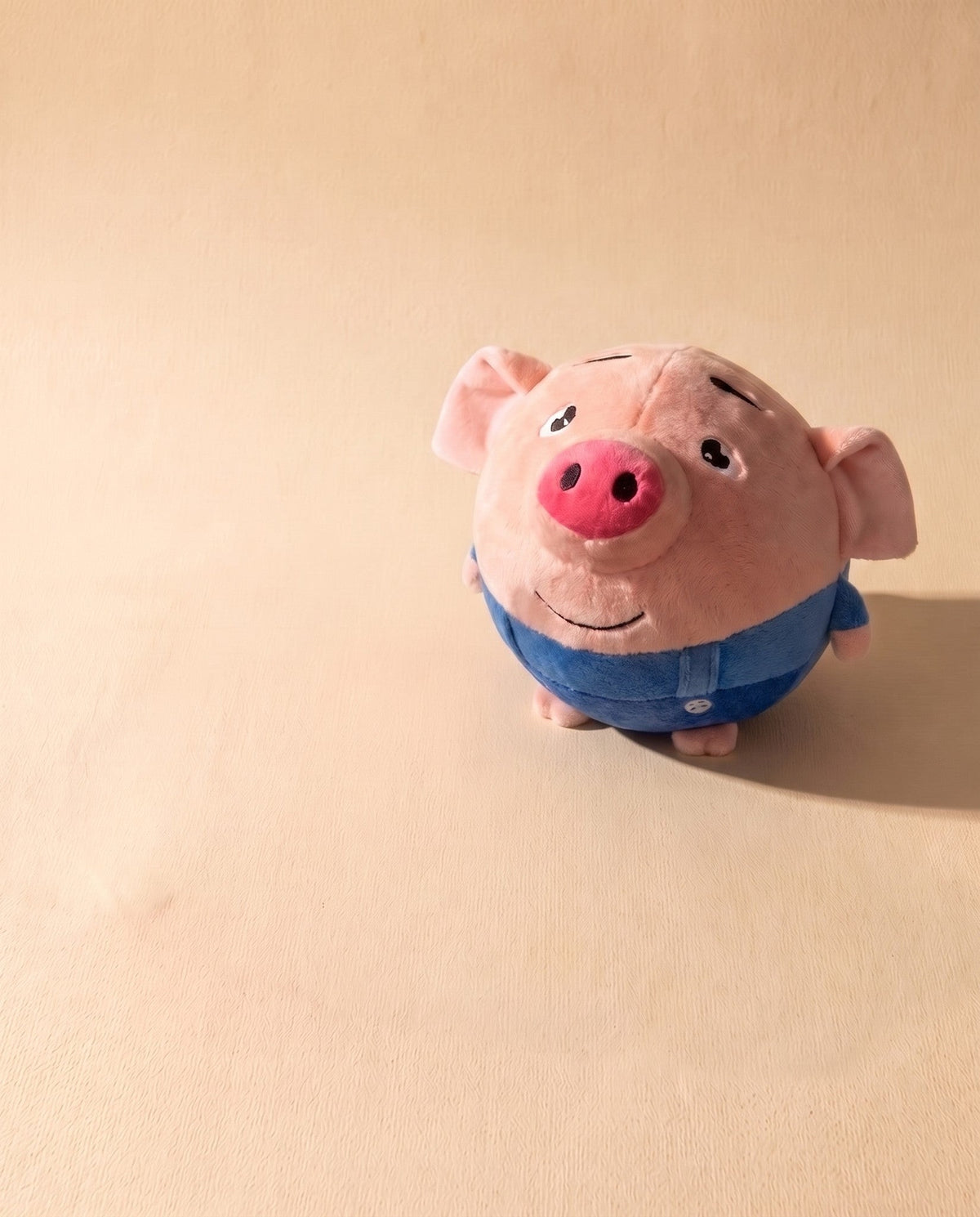 Self-Moving Plush Ball, Blue Pig, in use